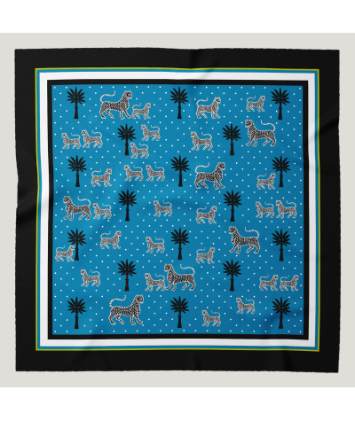 Pañuelo de seda Azul de Ortigia con estampado de palmeras y leopardos exóticos